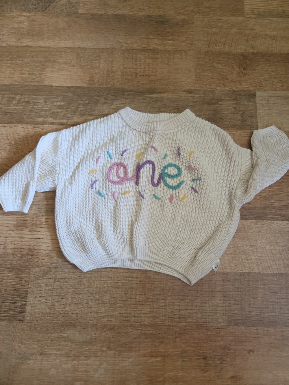 Embroidered First Birthday Sweater Cream Pink Yellow Purple Sprinkle Design